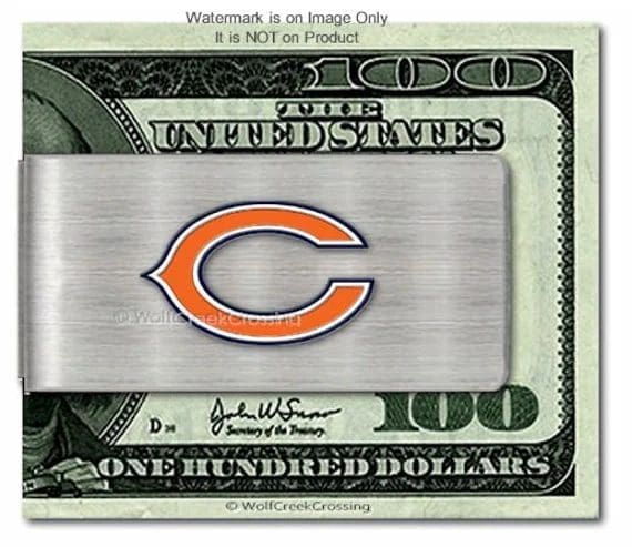 $100 bill with Chicago Bears logo overlay - promotional cash for sports fans.