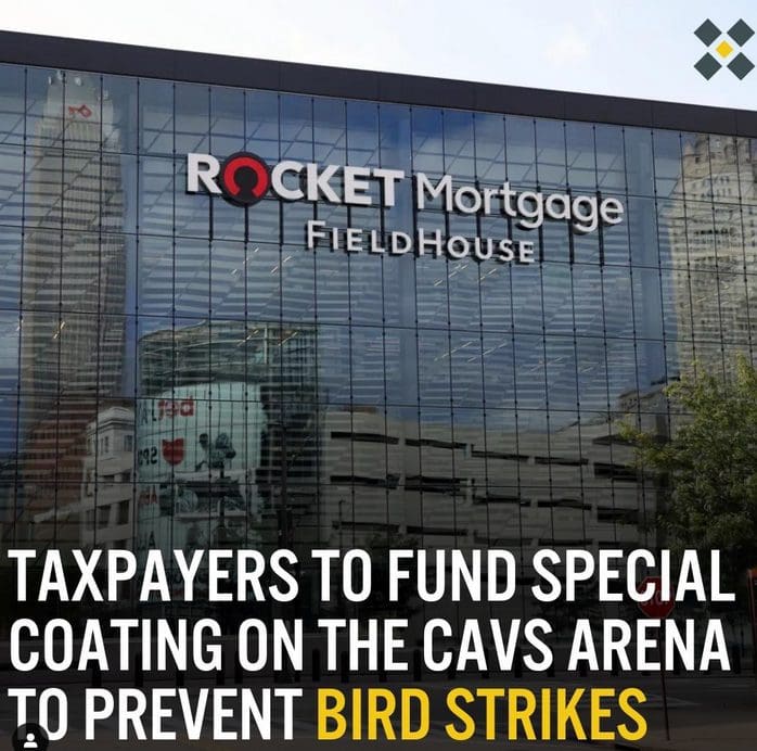 Rocket mortgage office building, glass facade, downtown urban setting, financial services branding, modern architecture.